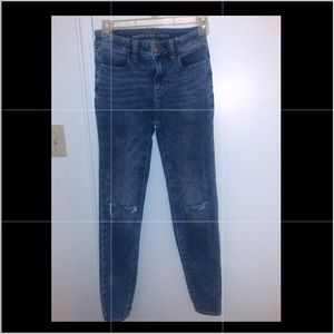 Mid rise stretchy dark blue jeans